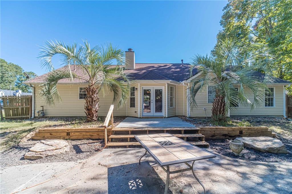 309 Magnolia Lane Monroe, GA 30655 - Photo 25 of 25 a front view of a house with garden
