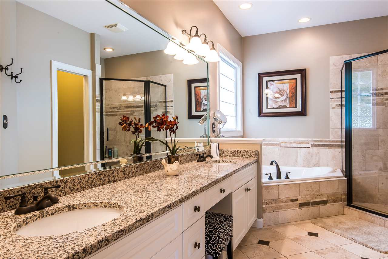 8200 Eden Close Court Raleigh, NC 27613 - Photo 9 of 15 Granite and Tile give the feel of LUXURY. Master Bath/Spa