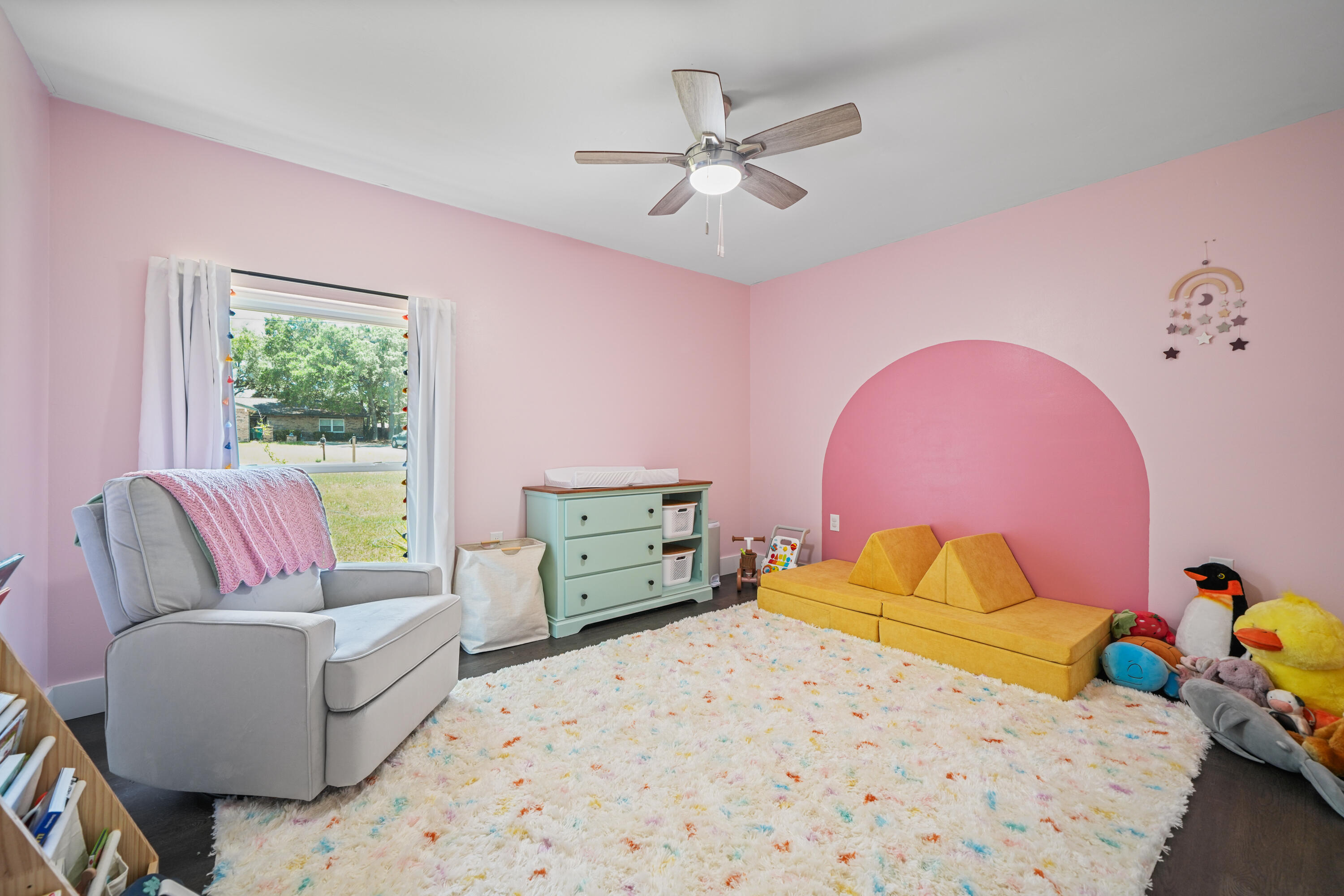39 9th Street Shalimar, FL 32579 - Photo 16 of 37 a bedroom with a bed and window