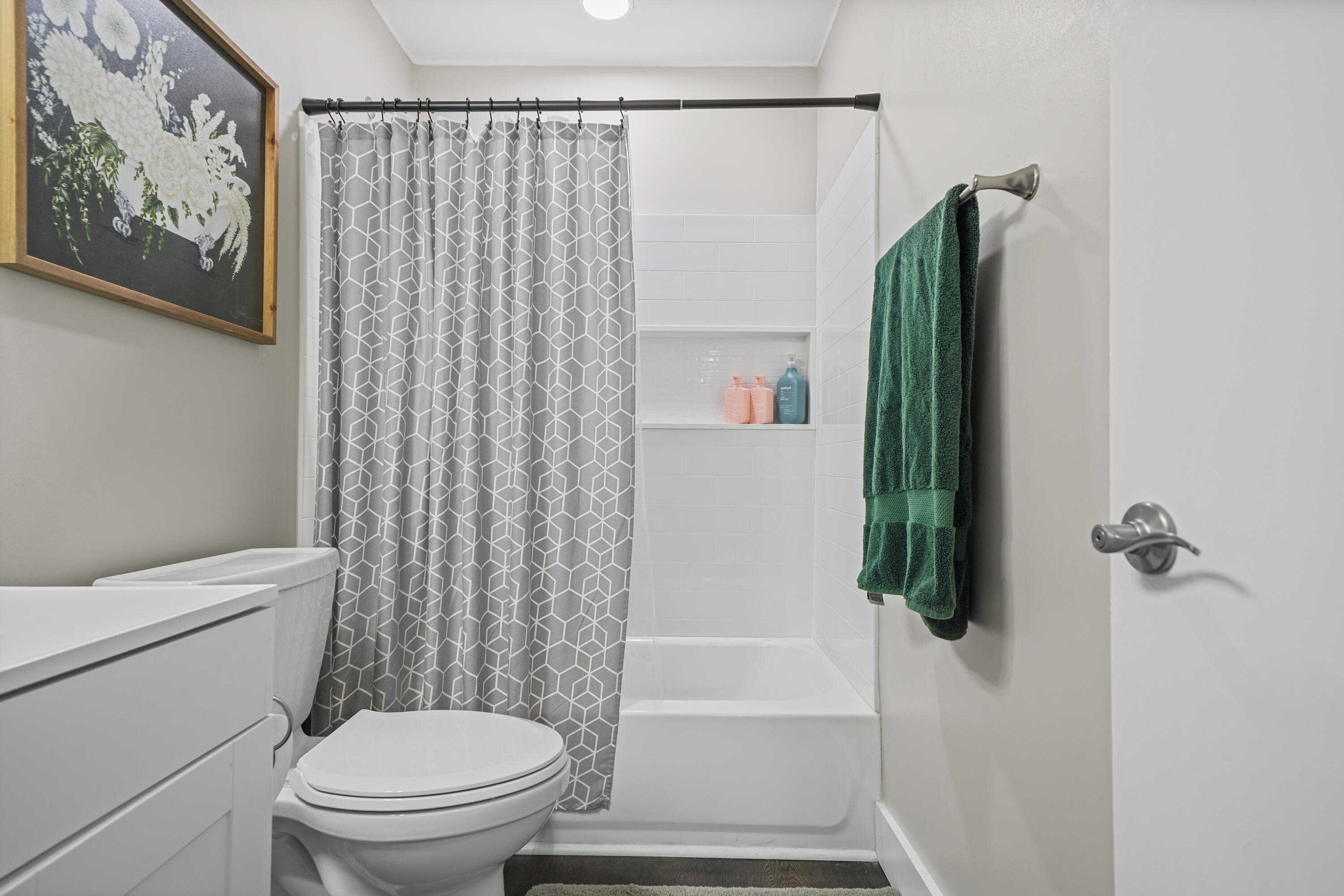 39 9th Street Shalimar, FL 32579 - Photo 19 of 37 a bathroom with a shower and a toilet