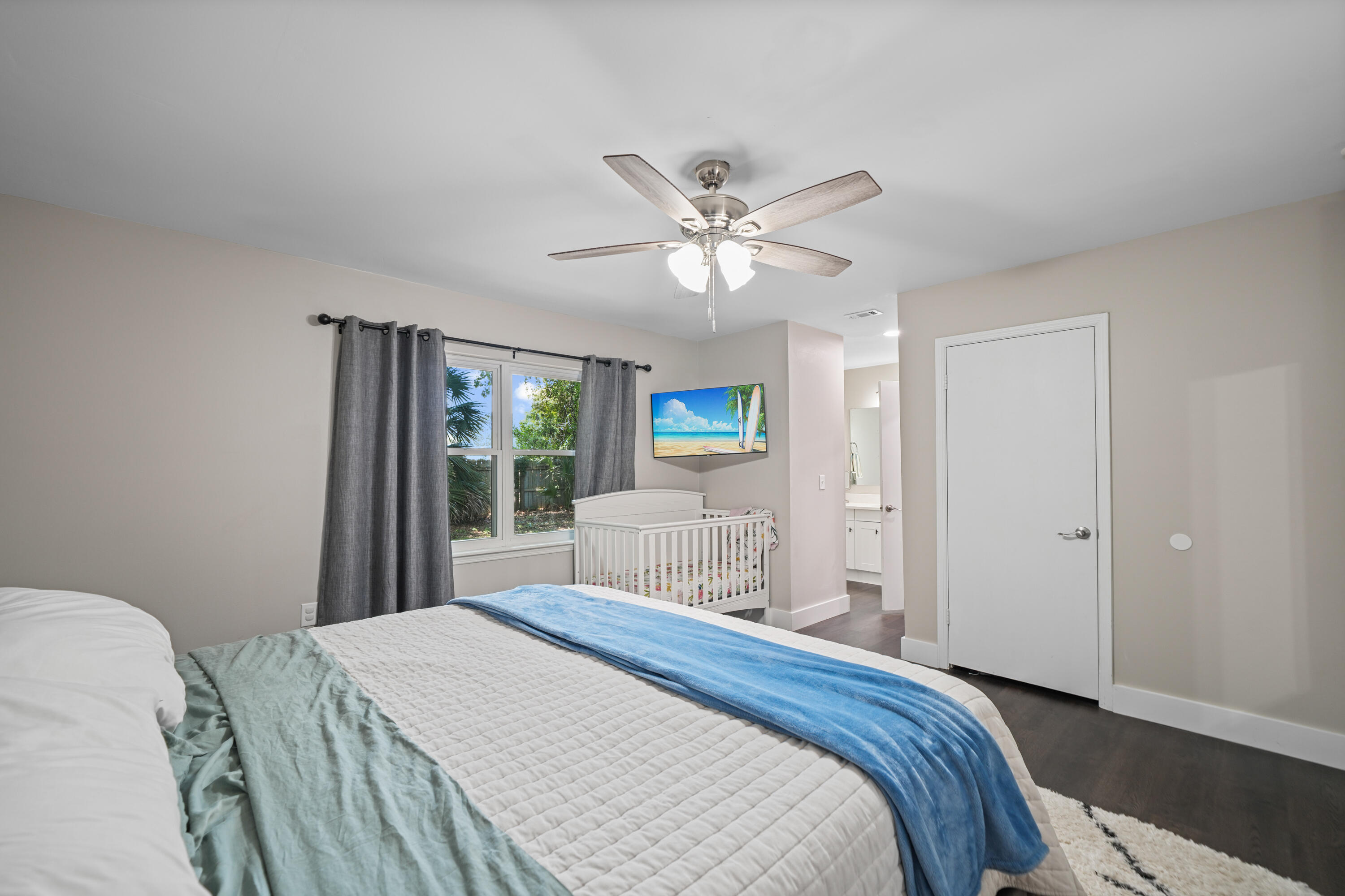 39 9th Street Shalimar, FL 32579 - Photo 25 of 37 a bedroom with a large bed and a window