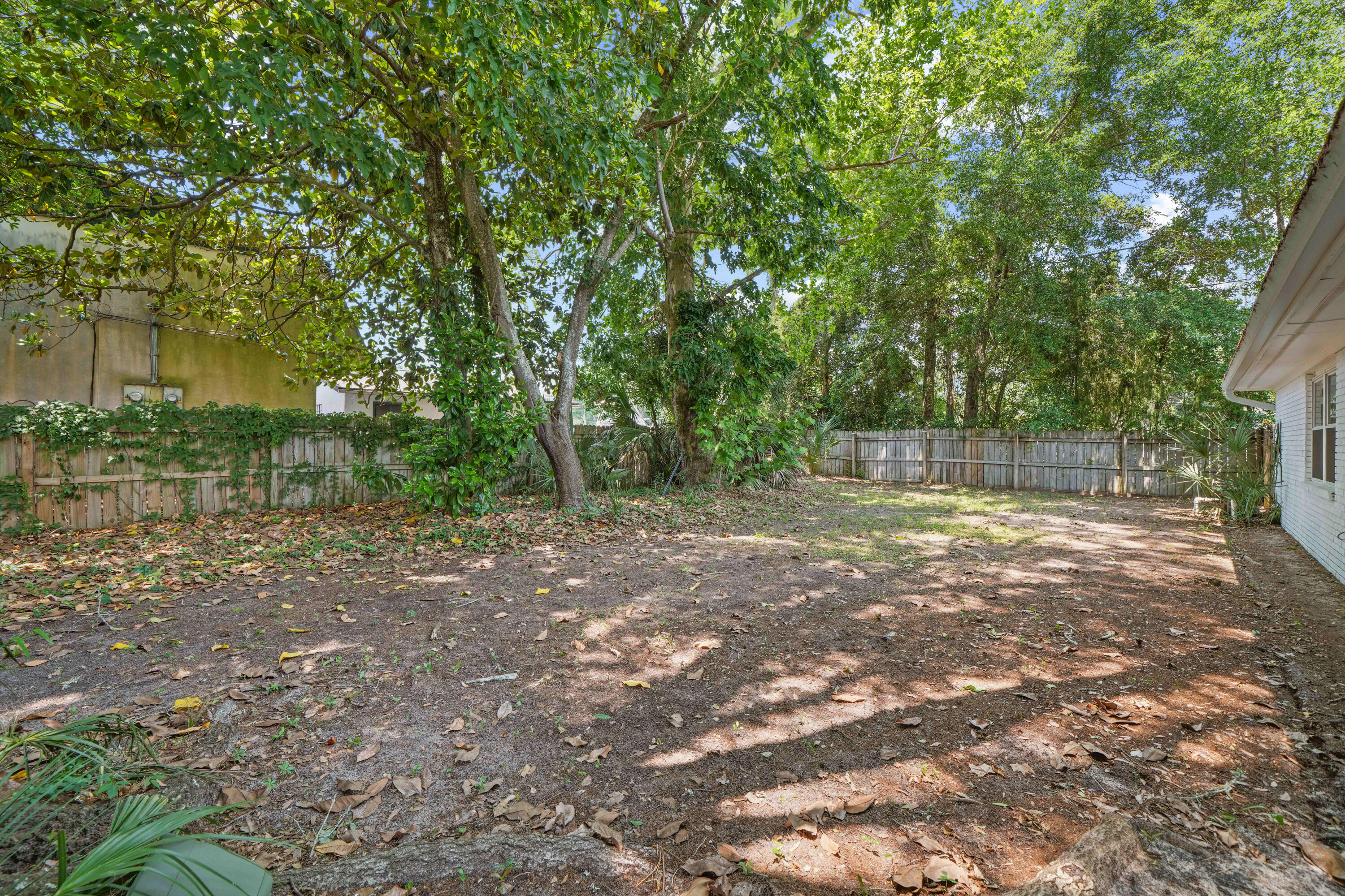39 9th Street Shalimar, FL 32579 - Photo 36 of 37 a view of backyard with green space