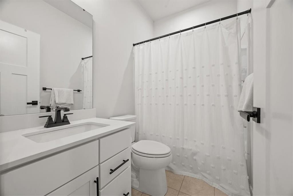 9004 Hickory Road Gibsonia, PA 15044 - Photo 28 of 37 a bathroom with a sink a toilet and shower