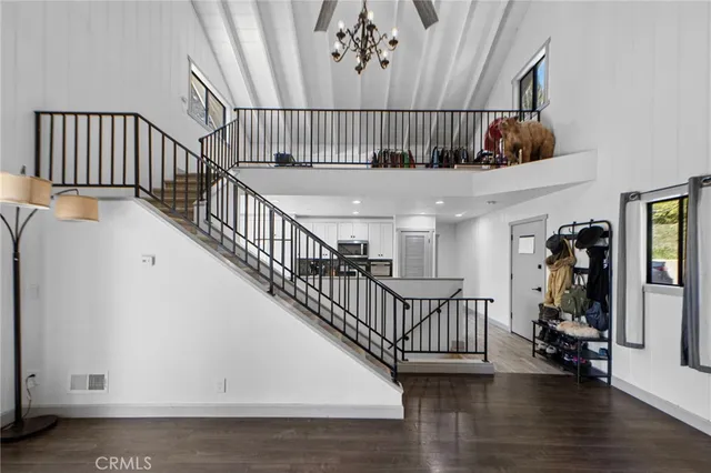 a view of entryway with wooden floor