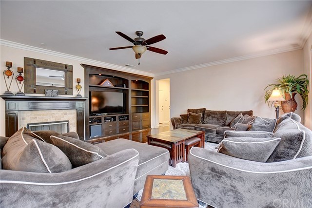 8546 Millpond Place Riverside, CA 92508 - Photo 16 of 60 a living room with furniture and a flat screen tv