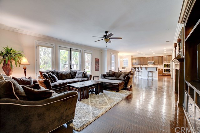 8546 Millpond Place Riverside, CA 92508 - Photo 17 of 60 a living room with furniture and a chandelier