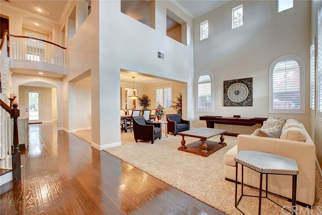 8546 Millpond Place Riverside, CA 92508 - Photo 2 of 60 a living room with furniture and wooden floor