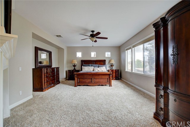 8546 Millpond Place Riverside, CA 92508 - Photo 25 of 60 a living room with furniture and a large window