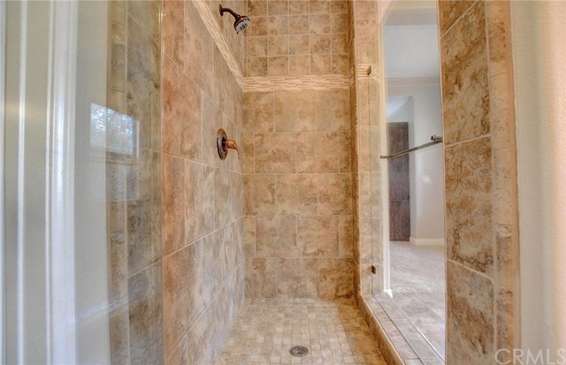 8546 Millpond Place Riverside, CA 92508 - Photo 30 of 60 a bathroom with a shower
