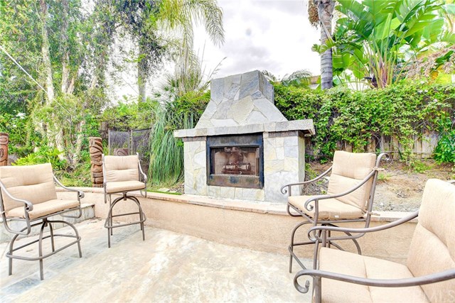 8546 Millpond Place Riverside, CA 92508 - Photo 38 of 60 a view of a chairs and table in patio