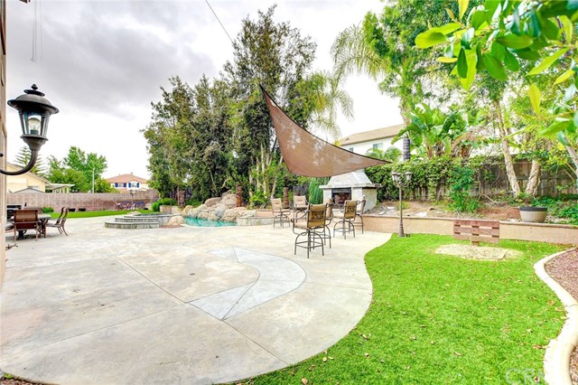8546 Millpond Place Riverside, CA 92508 - Photo 39 of 60 a view of a swimming pool with a patio