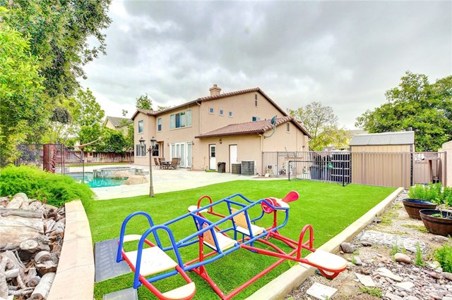 8546 Millpond Place Riverside, CA 92508 - Photo 50 of 60 a front view of house with yard and outdoor seating
