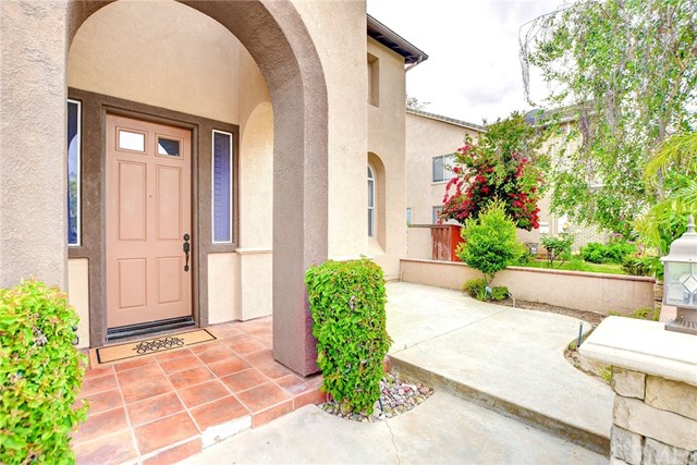 8546 Millpond Place Riverside, CA 92508 - Photo 54 of 60 a front view of a house with garden