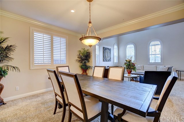 8546 Millpond Place Riverside, CA 92508 - Photo 9 of 60 a view of a dining room with furniture and window