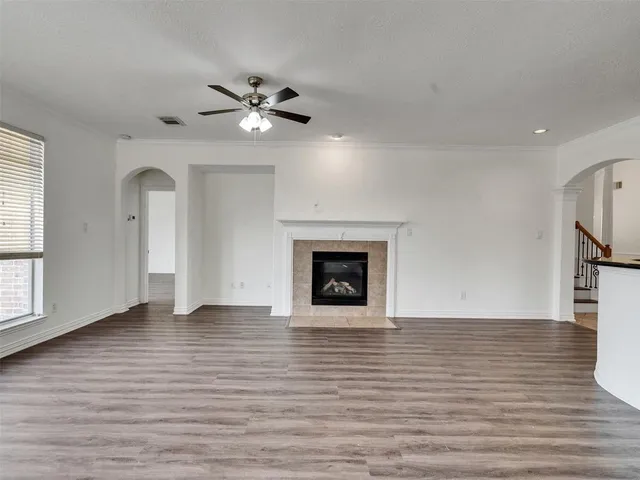 a view of a kitchen with a sink and a window