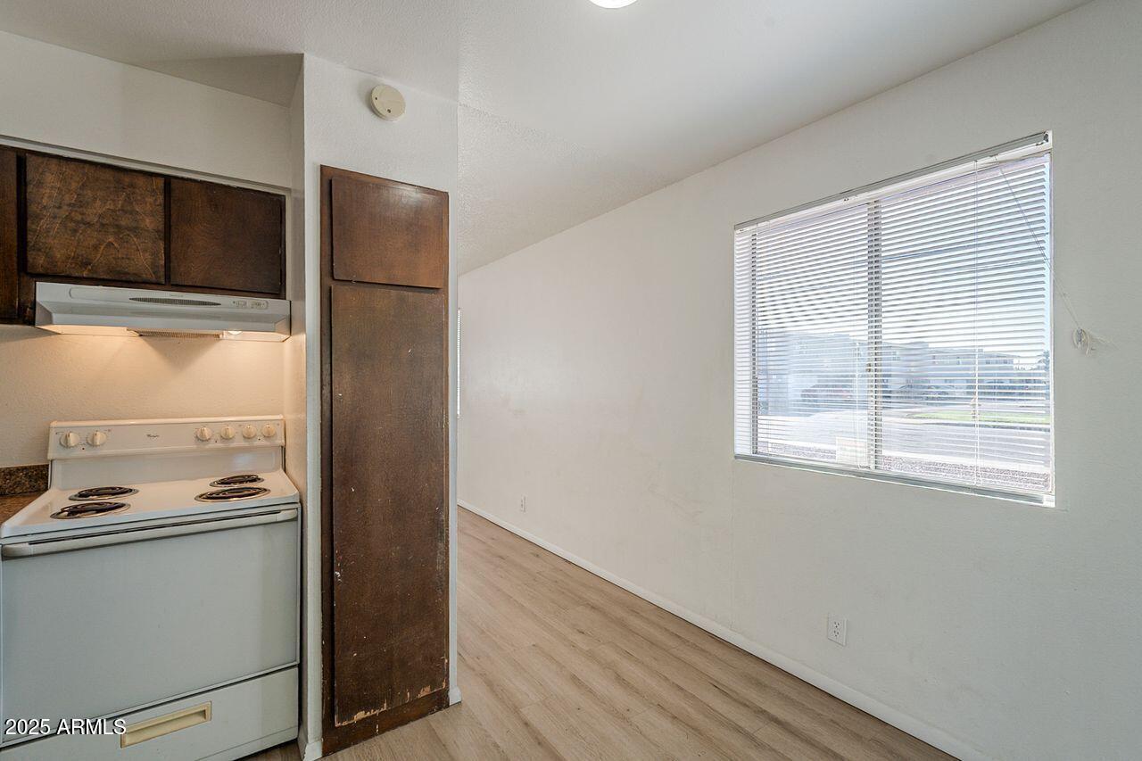 2608 West Ocotillo Road Phoenix, AZ 85017 - Photo 20 of 56 a view of kitchen with refrigerator and window
