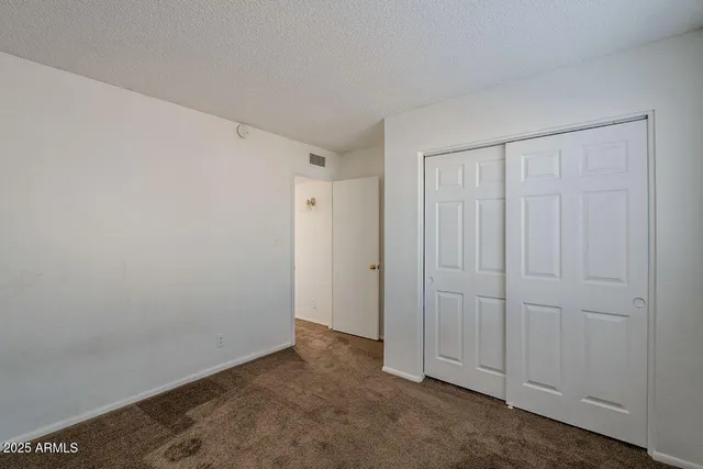 a bathroom with a sink vanity and a mirror