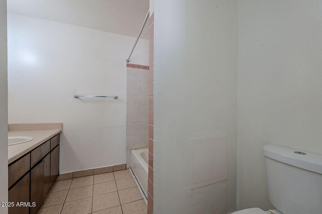 2608 West Ocotillo Road Phoenix, AZ 85017 - Photo 47 of 56 a bathroom with a sink and toilet