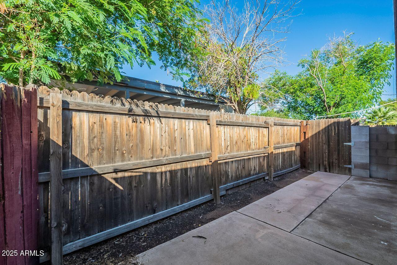 2608 West Ocotillo Road Phoenix, AZ 85017 - Photo 51 of 56 a view of a wooden fence