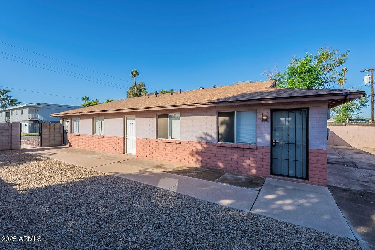 2608 West Ocotillo Road Phoenix, AZ 85017 - Photo 6 of 56 a front view of a house with a yard
