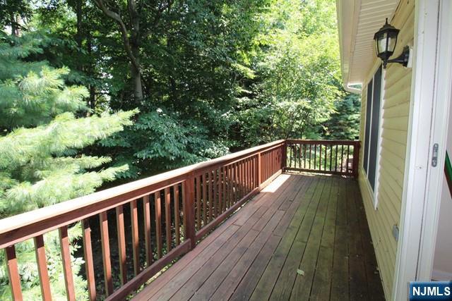 46 Pine Lake Terrace, Unit T046 Westwood, NJ 07675 - Photo 15 of 17 a view of balcony with wooden floor
