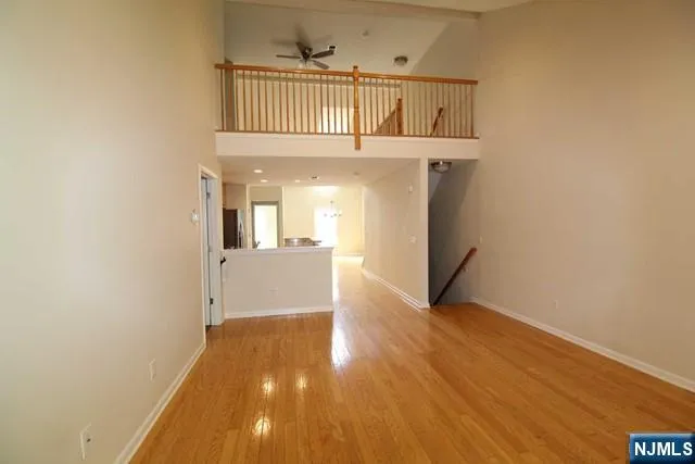a view of a kitchen from the hallway