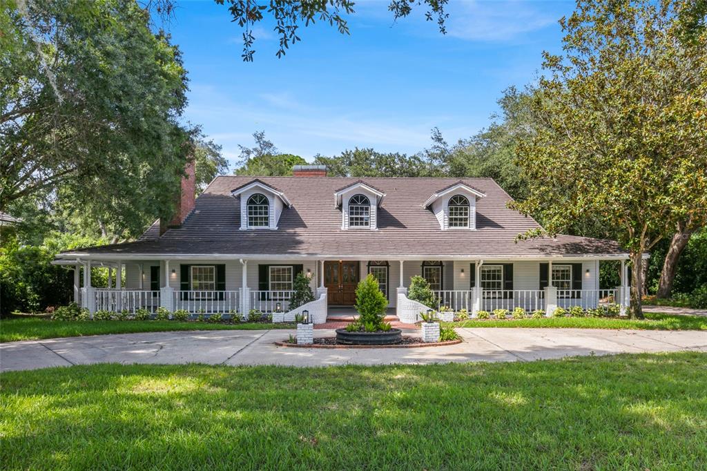 1409 Shadwell Circle Heathrow, FL 32746 - Photo 1 of 1 a front view of a house with swimming pool having outdoor seating