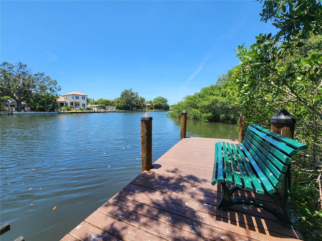 850 South Tamiami Trail, Unit 409 Sarasota, FL 34236 - Photo 16 of 22 a view of a lake with sitting area