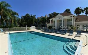 850 South Tamiami Trail, Unit 409 Sarasota, FL 34236 - Photo 18 of 22 a front view of house with yard and outdoor seating