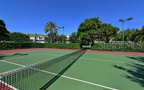 850 South Tamiami Trail, Unit 409 Sarasota, FL 34236 - Photo 20 of 22 a view of a tennis court