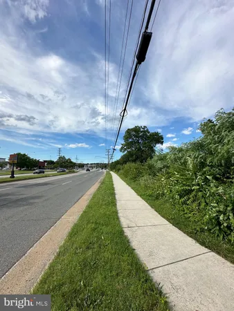 a view of a pathway both side of building