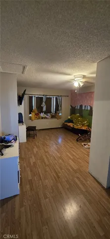 a view of living room and kitchen with furniture