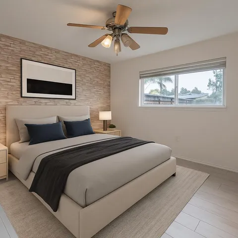 a bedroom with bed and window