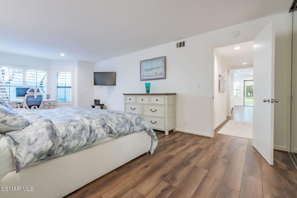 4481 Antigua Way Oxnard, CA 93035 - Photo 21 of 76 a spacious bedroom with a bed and a dresser