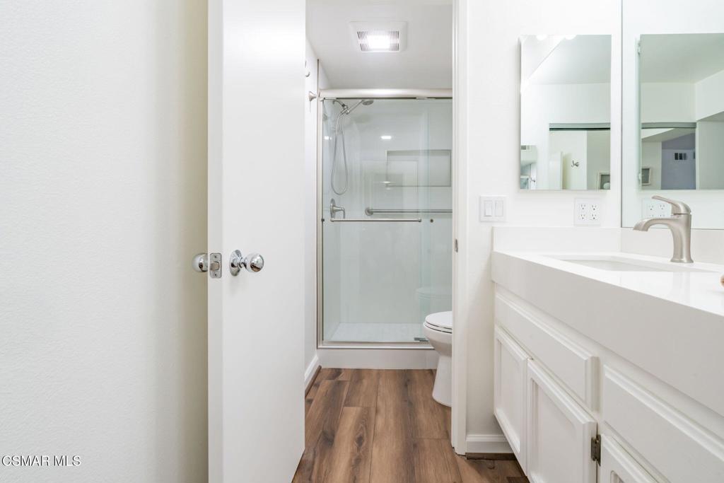 4481 Antigua Way Oxnard, CA 93035 - Photo 26 of 76 a bathroom with a sink and mirror