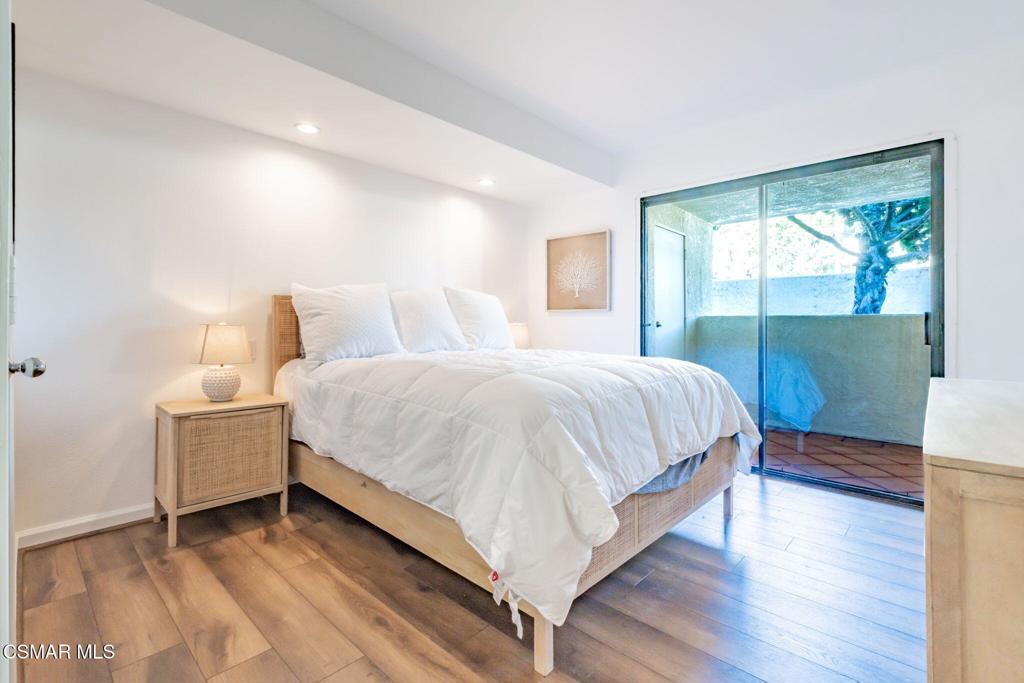 4481 Antigua Way Oxnard, CA 93035 - Photo 29 of 76 a bed room with a bed and a night stand