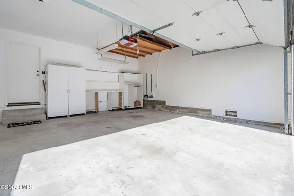an empty room with a projector