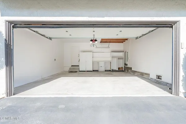 a view of a house with swimming pool