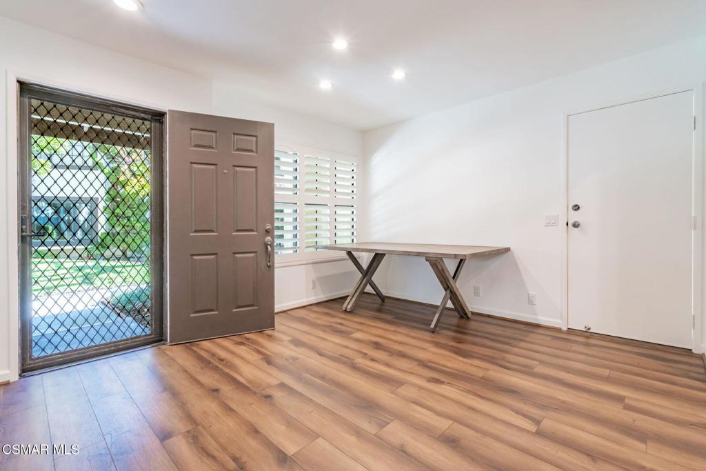 4481 Antigua Way Oxnard, CA 93035 - Photo 5 of 76 a view of a room with a wooden floor and a window