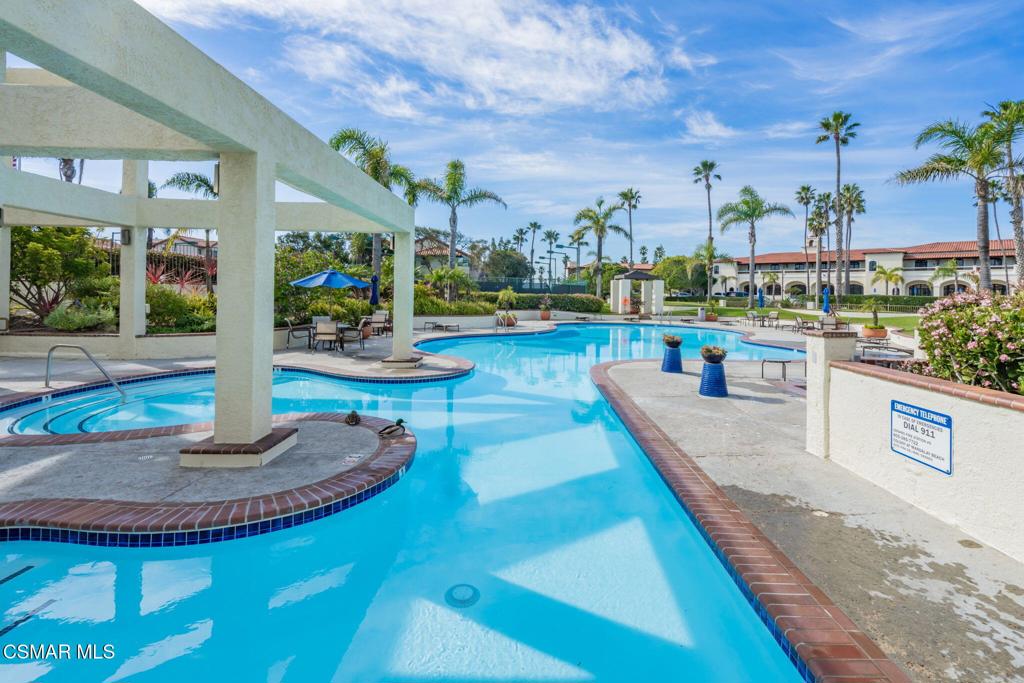 4481 Antigua Way Oxnard, CA 93035 - Photo 56 of 76 a view of a house with swimming pool and sitting area
