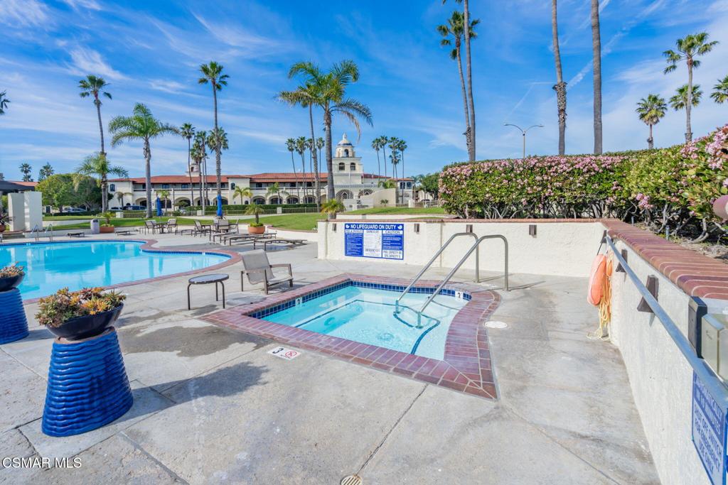 4481 Antigua Way Oxnard, CA 93035 - Photo 57 of 76 a view of a swimming pool with a lounge chairs