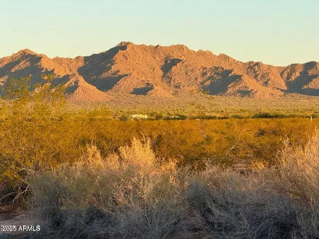 a view of mountain with lake view