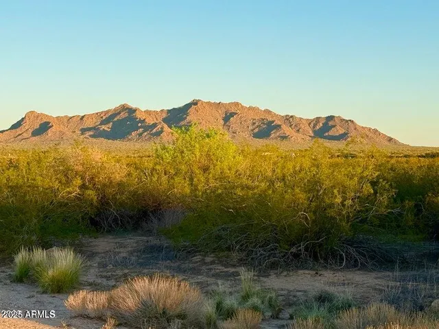 a view of a lake with mountains