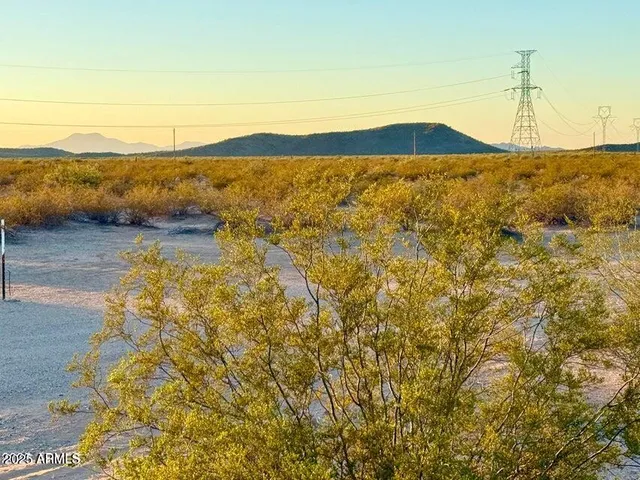 a view of an ocean and mountain