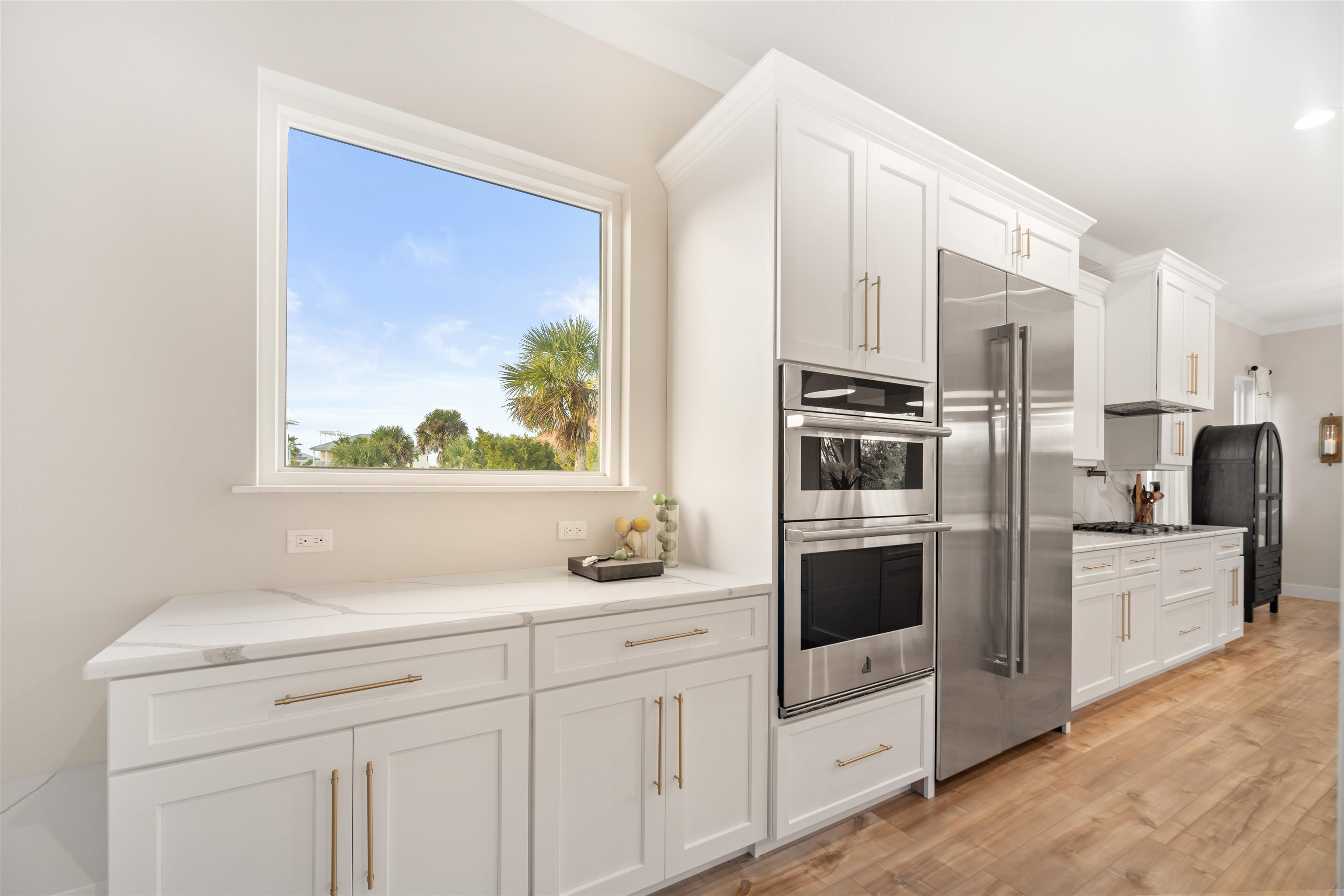 2549 Palm Avenue Flagler Beach, FL 32136 - Photo 16 of 65 a kitchen with stainless steel appliances a refrigerator sink and stove