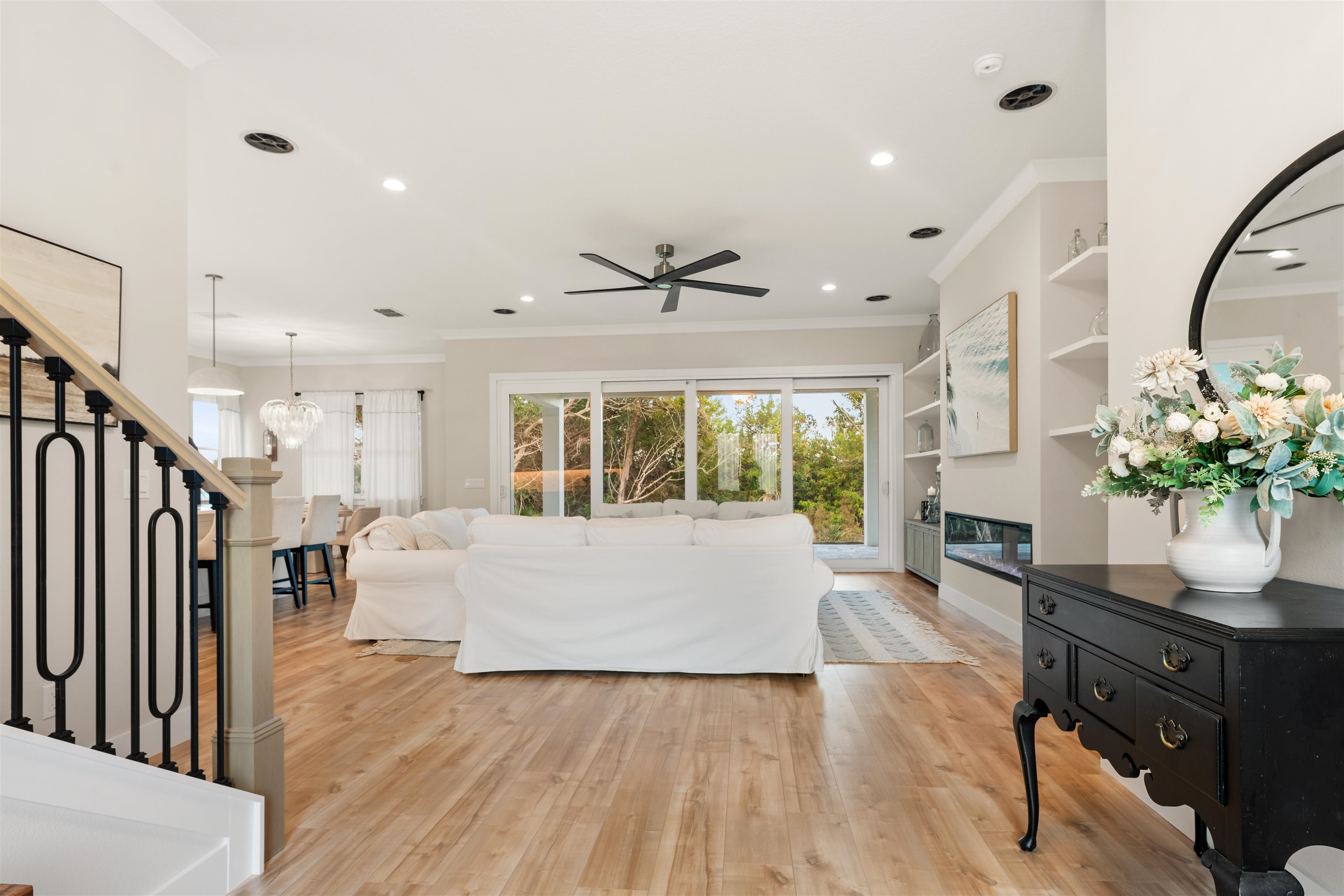 2549 Palm Avenue Flagler Beach, FL 32136 - Photo 2 of 65 a living room with furniture fireplace and a large window