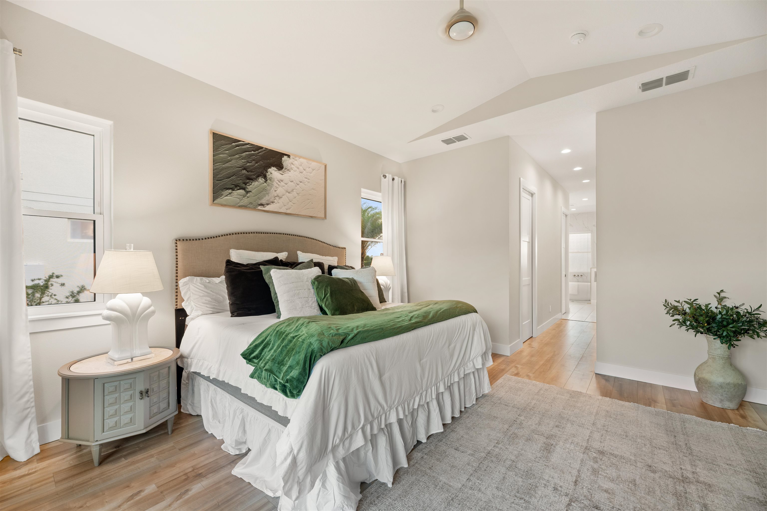 2549 Palm Avenue Flagler Beach, FL 32136 - Photo 23 of 65 Bedroom with vaulted ceiling, a closet, light wood-style floors, and recessed lighting