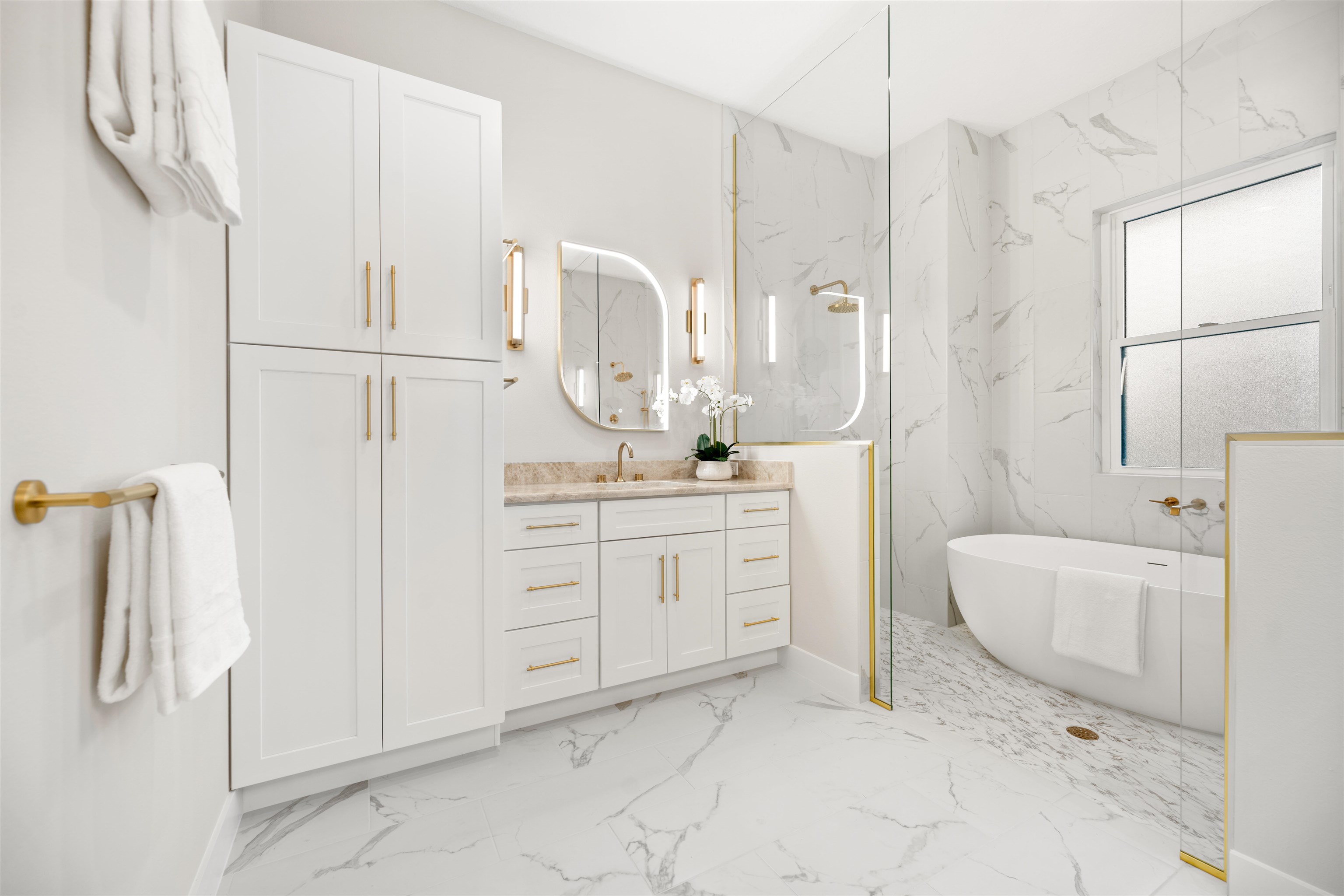 2549 Palm Avenue Flagler Beach, FL 32136 - Photo 23 of 70 a spacious bathroom with a double vanity sink a mirror and a shower