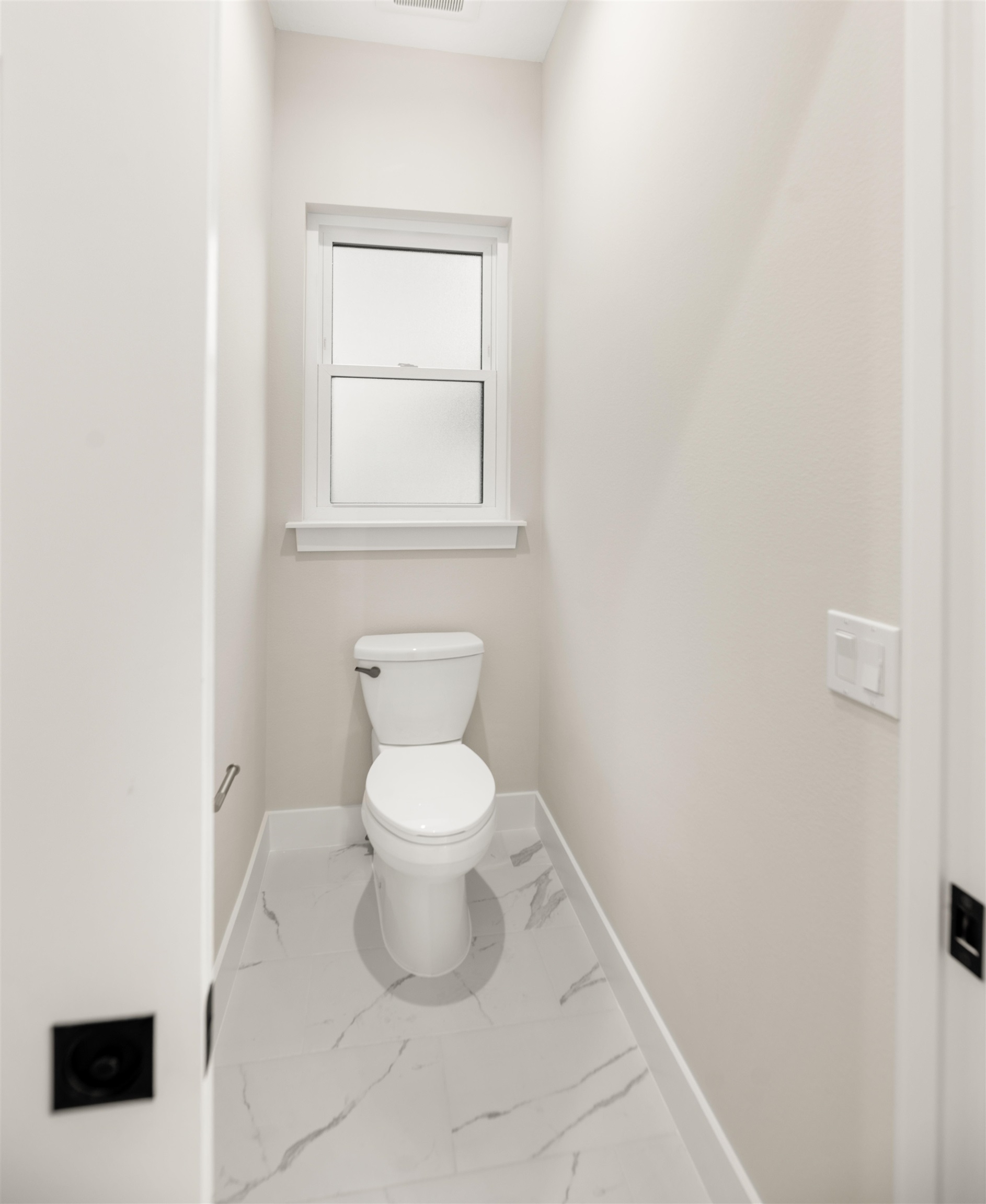 2549 Palm Avenue Flagler Beach, FL 32136 - Photo 28 of 65 a bathroom with a toilet