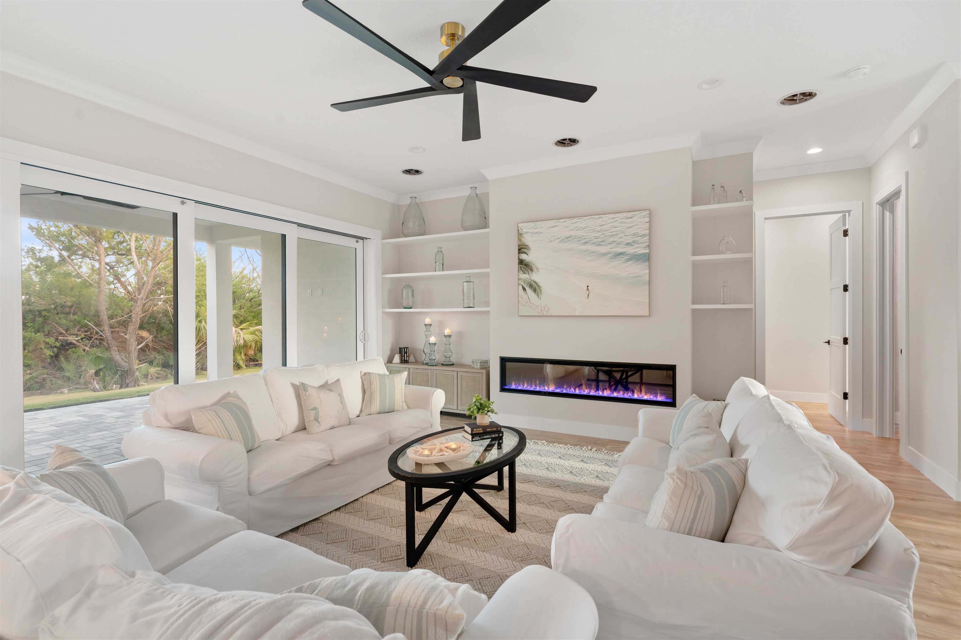 2549 Palm Avenue Flagler Beach, FL 32136 - Photo 32 of 70 a living room with furniture and a large window